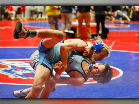 Blake Summers throws Lovett wrestler Alex Hyman to the mat during his state championship match, Wednesday, February 10.