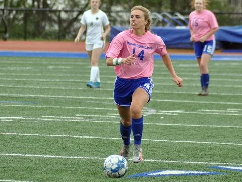 Kinsley Sullivan pushes the ball up the field for the Lady Rebels soccer team in their game against Pepperell Friday, April 16.