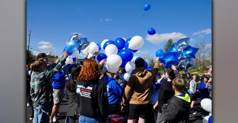 Fannin County Middle School football players released balloons before the rest of their peers in honor of fallen teammate Shane Adrian “Dewey” Derreberry Thursday, April 1.