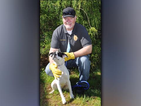 This female mix was picked up on Piney Ridge in Mineral Bluff May 11. She has a beautiful white coat with black spots. View her using intake number 146-21. She is shown with Animal Control Officer Paul Cochran.