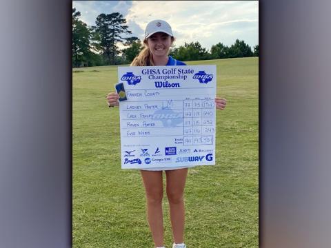 Lady Rebel golfer Lainey Panter was all smiles as she showed off the Lady Rebels scorecard after she won the AA Girls Golf State Championship. Panter finished the tournament with a blazing score of 152.
