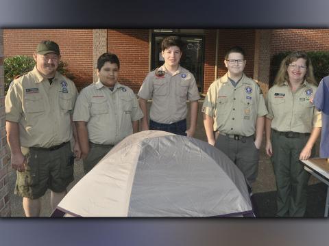 Scout Troop 32 and Cub Pack 432 were all smiles as they assisted in the Epworth Community Club Pancake Breakfast Saturday, July 3. Shown are, from left, Assistant Scout Master Raymond Green, Jordan Kinman, Chase Roll, Roy Green and Pack 432 Community Chairman Glenda Green.