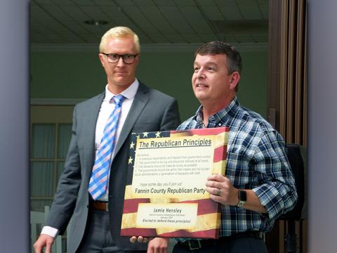 Fannin County Commission Chairman Jamie Hensley was recognized for his contribution to the Republican Party during a Fannin County Republican Party meeting Monday, July 19. Hensley, right, stands beside Fannin County Republican Party Chairman Frank Wood, who presented Hensley a plaque honoring his efforts.