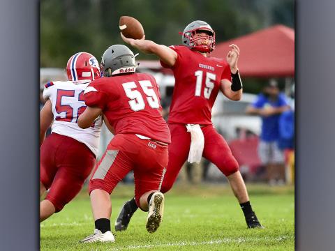Copper Basin quarterback Joe Boggs uncorks a throw during the Cougars game against Polk County Friday, August 20.