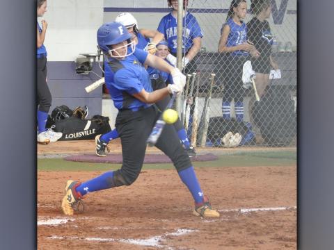 Josilynn Newton unloads on a ball in recent action for the Fannin County Lady Rebel softball team.