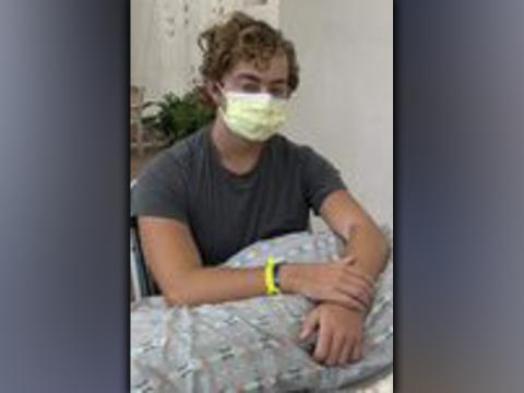Jackson Davis is shown leaving the hospital after having emergency surgery. 