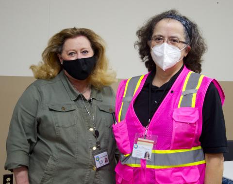North Georgia Health District Communications Specialist Jennifer King, left, and Fannin County Health Department Nursing Supervisor Angela Blevins wait for individuals to get the COVID-19 vaccine during the health department’s COVID-19 Vaccination Clinic at the Kiwanis Club of Blue Ridge fairgrounds Saturday, September 18.