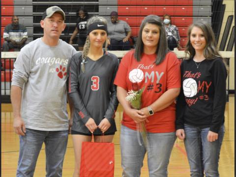 The Copper Basin Lady Cougar volleyball team honored eight seniors during the last home game of the season Thursday, September 23. Shown during the ceremony are, from left, Johnathan Smith, father; senior Gracie Smith; Nakema Smith, mother; and Abby Smith, sister.