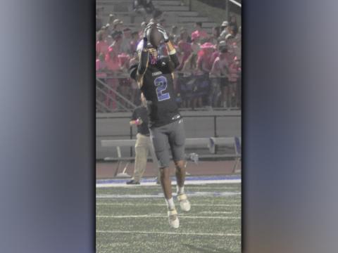 Hayden Lynch snags one of his five catches against the Pepperell Dragons Friday, October 1. Lynch had 44 receiving yards in the Rebels 40-14 victory.