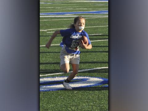 Ryann King (5) breaks off a big gain in the Lady Rebels 33-7 win over the Dawson County Lady Tigers Saturday, October 23.