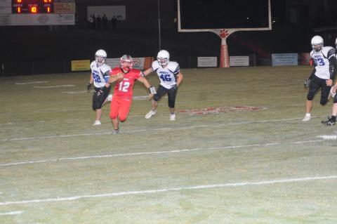 Copper Basin’s Sebastian Baliles outruns two Bradley Knights in football action Friday night. Baliles paced the Cougars’ effort in a 62-0 homecoming win over the Knights. This Friday, the Cougars will travel to Whitwell for a region contest that begins at 7 p.m.
