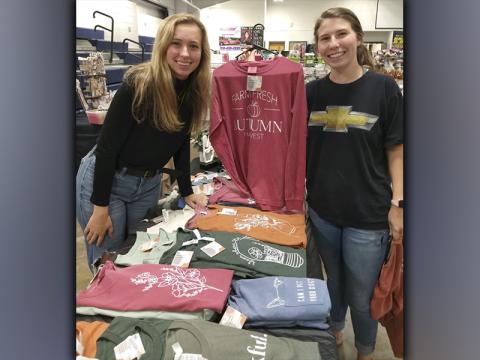 Vendor Kyndall Ledford, left, and Blue Ridge Elementary School teacher Hannah Nicholson take part in the Annual Harvest Sale the weekend of October 16 that was held at the Fannin County School System Ag Facility.