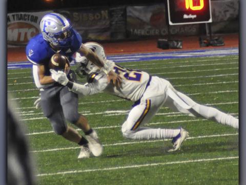 Corbin Davenport (8) sheds a tackle for a big gain during the Rebels home playoff game against Fitzgerald in the sweet sixteen round of the Georgia High School Association’s State Playoffs.