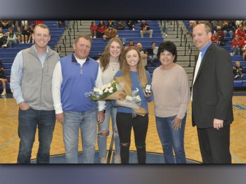 Lainey Panter was awarded her Georgia High School Association (GHSA) 2021 Class 2AA State Championship ring, Saturday, November 20. Panter was a dominant golfer during her time with the Fannin County Lady Rebels golf team. Panter was recognized in between the Fannin County and Copper Basin basketball games on the first night of the ETC Tournament. Shown with Panter are, from left, Austin Panter, brother; Kevin Panter, father; Abby Ledford; state champion Panter; Loraine Panter, mother; and Bryan Richerson.