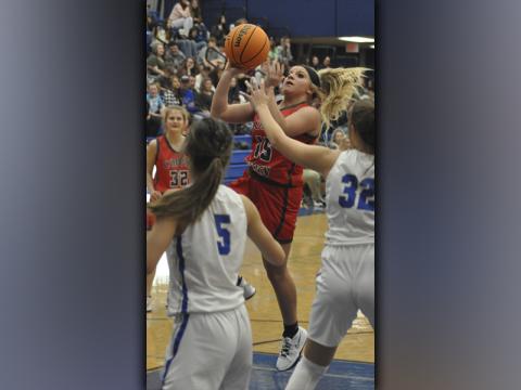 Destiny Pittman goes up for a two-point floater in recent action for the Copper basin Lady Cougar basketball team.