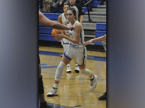 Reigan O’Neal cuts to the lane for a two-point basket in recent action for the Fannin County Lady Rebels basketball team.