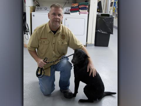 This male mix was picked up on Old Highway 5 in Blue Ridge December 21. This boy is solid black and has a lame front leg. View this sweetie using intake number 424-21. He is shown with animal control Officer Luke McDonald.