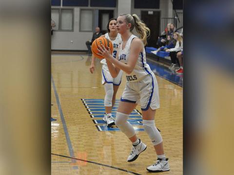 Lady Rebel Ava Queen eyes a three-point basket in recent action for the Fannin County Lady Rebel basketball team.