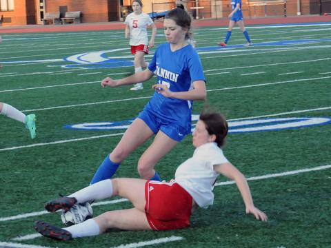 Fannin County’s Cali Tuggle battles for the ball in soccer action at Fannin County High School earlier this season. The Lady Rebels are 5-0 and 2-0 in the region going into Friday’s match against region foe Pepperell at home. The girls’ match begins at 5 p.m. and the boys’ will get underway at 7 p.m.