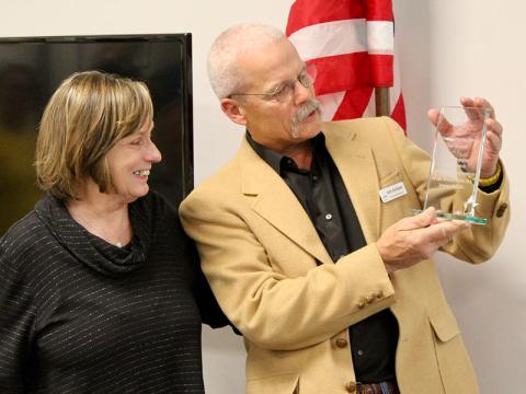 Long-time president of the Fannin County Chamber of Commerce Jan Hackett was awarded “Our Conservation Hero” by the local Blue Ridge Mountain Trout Unlimited (BRMTU) chapter for her commitment to the cold-water conservation of the Toccoa River and her years of support. The award was presented at the Back the Brookies Winter Bash Saturday, January 29. She is shown with BRMTU member and event coordinator Bob Borgwart. 