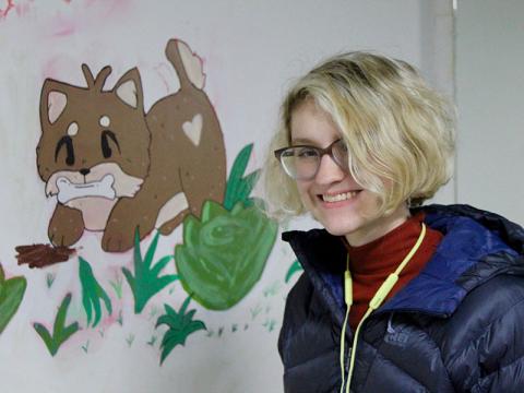 Fannin County High School Art Club members are gracing the walls of Wet Noses Pet Rescue with their talents. Shown working on part of a mural at Wet Noses is high school senior and art club member Kenna Verner. 