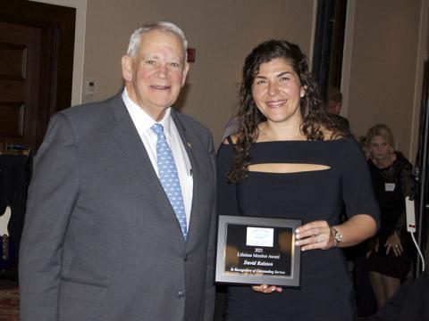 Georgia State representative and Speaker of the House of Representatives David Ralston is shown receiving an Honorary Lifetime Membership Award presented by Fannin County Chamber of Commerce President Christie Gribble.