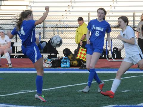 Kinsley Sullivan (14) and Hannah McSwain are shown in action for the Lady Rebels.