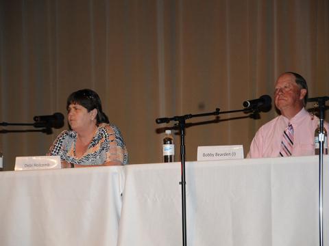 Fannin County Board of Education candidates, Debi Holcomb, left, and incumbent Bobby Bearden address the audience at the Chamber of Commerce Political Forum.