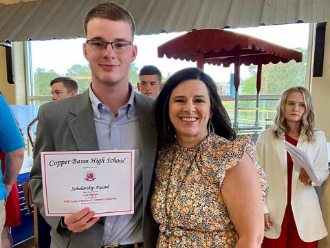 Polk County Chamber of Commerce Diplomat Jenny Mundy is shown with Copper Basin Graduate Cade Bigham after he received the Polk County Chamber of Commerce Scholarship.