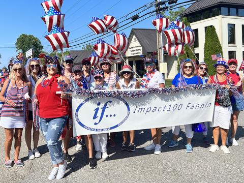 Members of Impact100 Fannin walked in the Old Timers Parade July 4 through downtown Blue Ridge. 