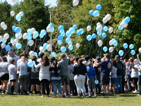 Members of the Fannin County Marching Band along with band parents, and a hand ful of school officials and members of the community, released balloons to honor Josh Cheatham’s memory as the band prepared to travel to the Armuchee Band Invitational in Rome Saturday. The band dedicated its performance to Cheatham.