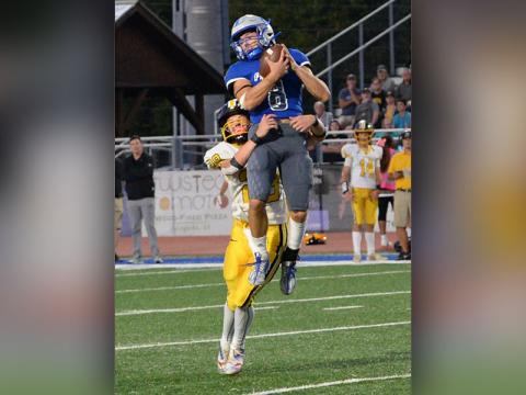 Corbin Davenport went high in the air for the Fannin County Rebels to make this catch against the visiting Murphy High School Bulldogs Friday night at the Fannin County stadium.