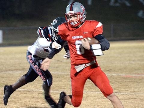 Avery Crowder (6) keep the ball secure as he breaks away from the defender in Friday night’s victory over the North Georgia Falcons. 