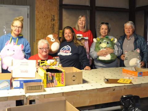 Getting ready for the annual Toys for Tots distribution is a full-time effort for many volunteers. Cathy Love Queen, Jody Guttridge, Toys for Tots Executive Director Cheryl Turner Jordan, Gale Mancuso, Sue Warner and Joel Warner, from left, are shown as they work toward gathering Christmas presents that will be handed out this weekend.