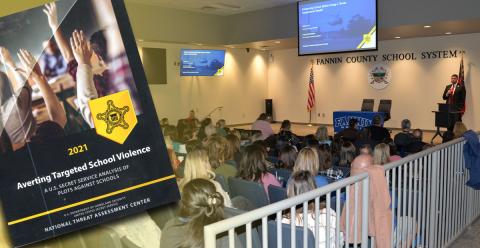 Members of the Fannin County School System who took part in Threat Assessment Training received the U.S. Secret Service anaylsis on Averting Targeted School Violence (left) along with two other publications aimed at taking a pro-active approach to stopping any attacks before they occur. Below, School Superintendent Dr. Michael Gwatney talks to the morning session gathering who packed the Staff Development Center Tuesday, January 3.