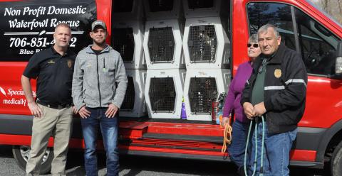 Fannin County Animal Control transported 17 dogs from their facility and three dogs from Gilmer County Animal Control January 26, after being at full capacity in the shelter. Pictured, from left, are Animal Control Officer Luke McDonald, Brandon Miller, Animal Control employee Theresa Burgess and Animal Control Officer JR Cornett.