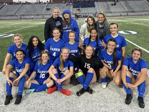 The Fannin County women’s soccer team smiles together after securing their playoff spot. Shown are, from left, front row, Natalie Middleton, Jordan Golden, Adia Galloway, Ivy Hyde, Madison Ponton and Maya Butler; middle row, Shaylee Jones, Nadia Rosas-Leal, Caroline Young, Karmah Eaton, Stephanie Kirk and Reese Lewis; back row, Assistant Coach Jordan Deal, Jayda Foster, Alexandria Foster and Head Coach Nancy Jessen; and not pictured, Emma Richardson and GiGi Torres. 