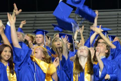 Members of the Fannin County High School Class of 2023 celebrate at the conclusion of graduation ceremonies Friday night on the football field at the high school. 