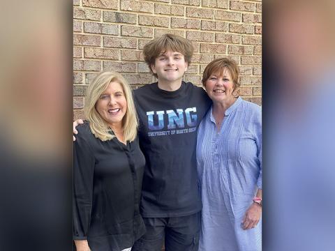 The author, Preston Patterson, is shown with his subject, Sally Masters, right, and Swan McKnight, another board member of Fannin Foster Families.