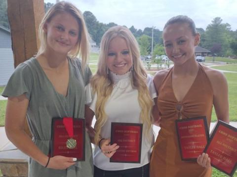 Riley Hall, Destiny Pittman and Taylee Hall are shown with the honors they received at the Copper Basin Lady Cougar softball banquet.