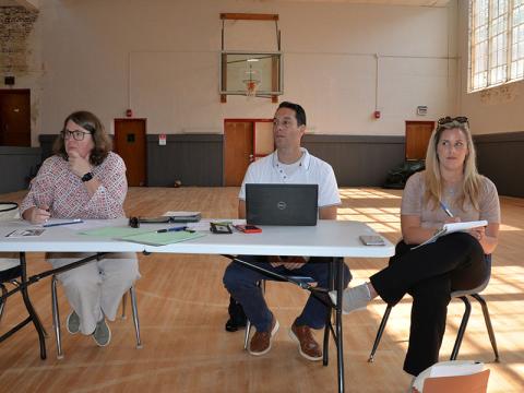 Leigh Elkins, Danny Bivins and Kaitlin Messich, from left, of the Carl Vinson Institute of Government at the University of Georgia listen to ideas from citizens regarding the future of the Ocoee Whitewater Center.