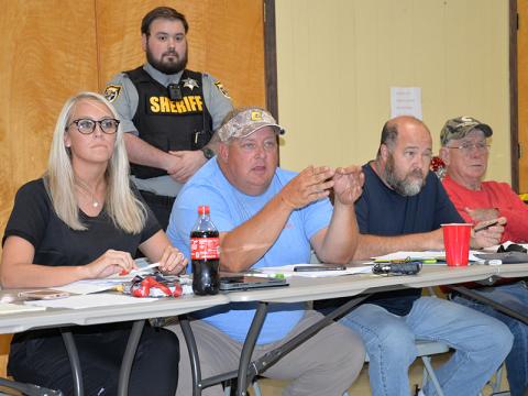 Polk County commissioners, from left, Samantha Trantham, Greg Brooks, John Pippenger and Mush Davis address concerns being expressed over biosolids during last week commission meeting at the Copper Basin Community Center.