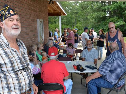 Steve Strickland, left, was one of the many veterans on hand as a large crowd gathered for the membership drive and open house at the Veterans Conference Center.