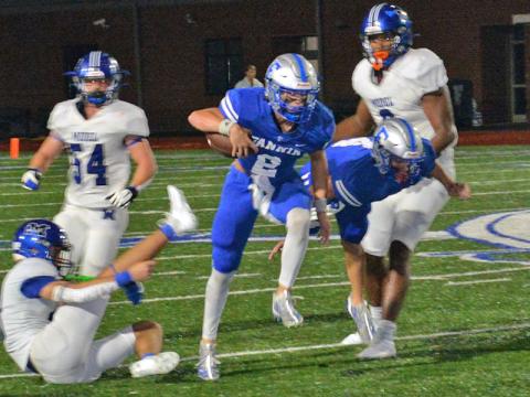 Lawson Sullivan splits the defense for the Fannin County Rebels earlier this season