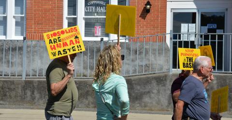 Copperhill City Hall was the final backdrop last week as protesters sought government help to stop the spread of biosolids at Copperhill Industries. The smell and possible harmful effects on the Ocoee River and underground water supply were among concerns.