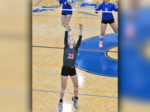 Peyton Grabowski sets up a shot for the Lady Cougars. She scored six kills against Tellico last Thursday. 
