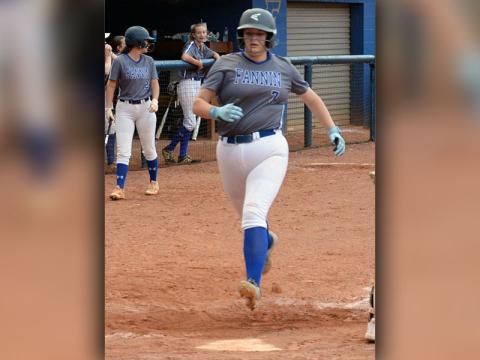 Rachel Adams crosses the plate in previous Lady Rebel action.
