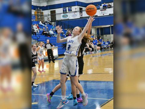 Lady Rebels Albany Cole (2) and Emma Holloway (44) pull down rebounds in Fannin County’s scrimmage against Andrews.