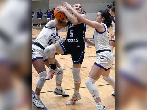 Callie Ensley (5) drives for two points against Union County Saturday.
