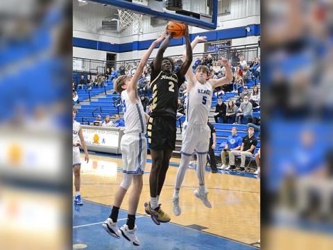 Fannin County’s Colton Kaylor (23) and Isaiah Angel (5) battle in recent action for the Rebels. Fannin’s recent win over Haralson moved the team into second place in Rebion 7AA